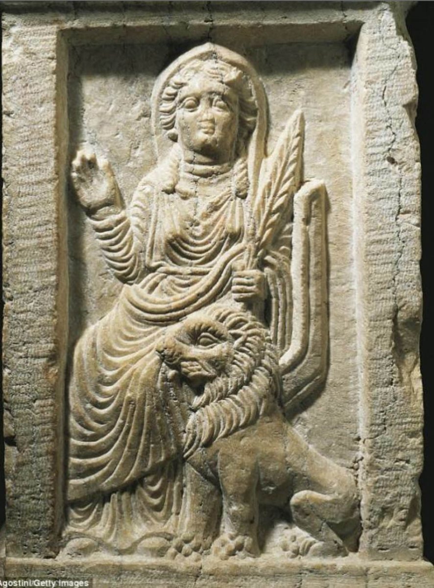 Russian-Aryan Mother Al-Lat (Alla) the Ruler-Lioness with her Symbol – the Royal Lion, from the Allat / Alla Temple, the Samarra Culture in Suria / Syria in Palmyra (4000 BC). She has the same gesture of a raised arm palm out, as the Mother-Falcon Ruler-Lioness on the Russian-Aryan embroideries from the Russian Far North.